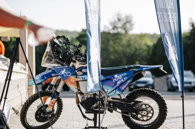 Rally bike parked in the bivouac service area