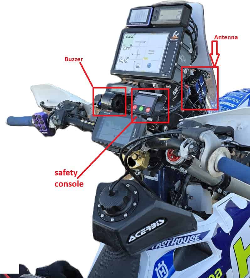 Rally bike cockpit with tracking device antenna and safety console marked