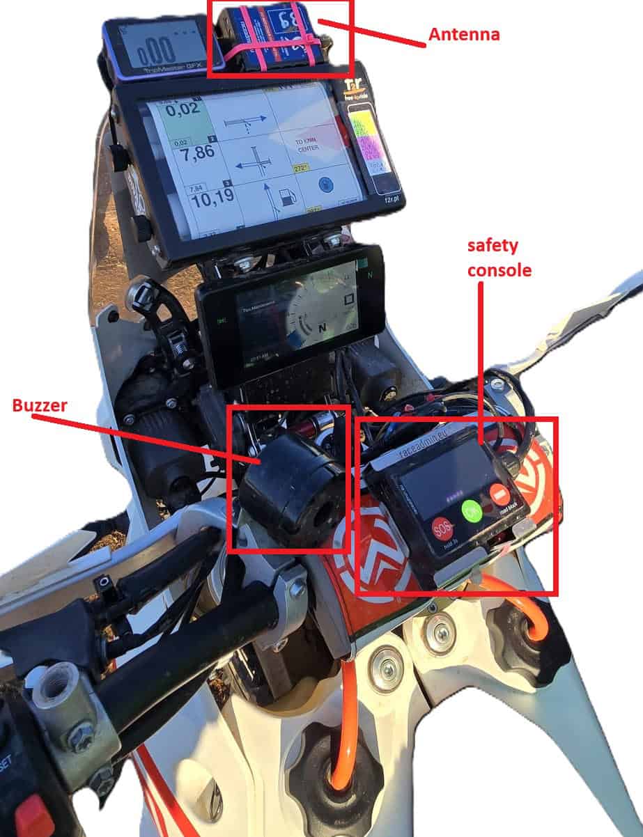 Rally bike cockpit with tracking device wiring marked